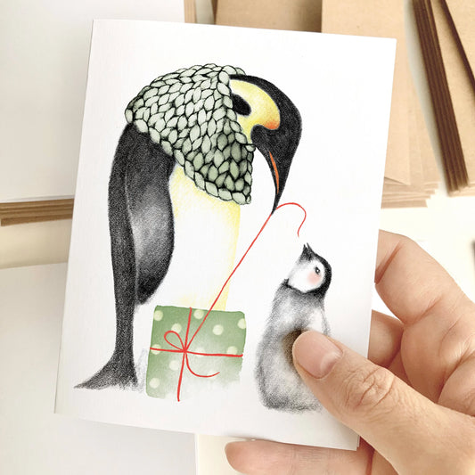 Carte de souhait - Noël manchots cadeau