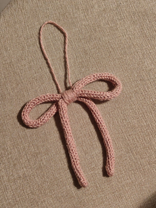 Ornement boucle tricot